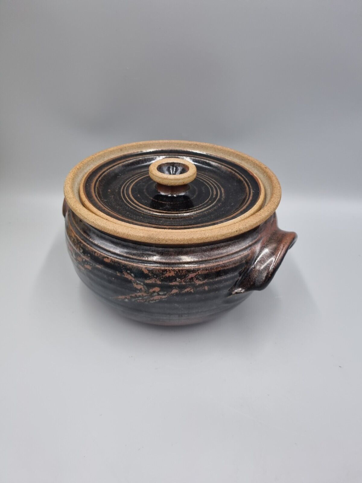 A Large Studio Pottery Lidded Casserole Dish By John Lomas.