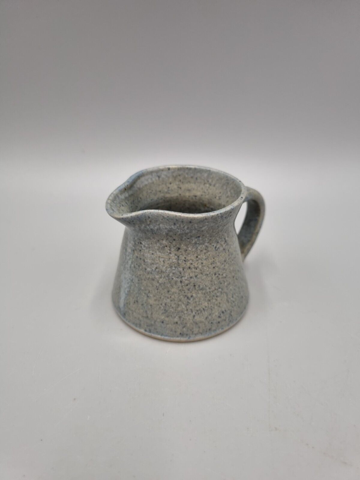 A Small Studio Pottery Jug, 'Storrington' Written To The Base.