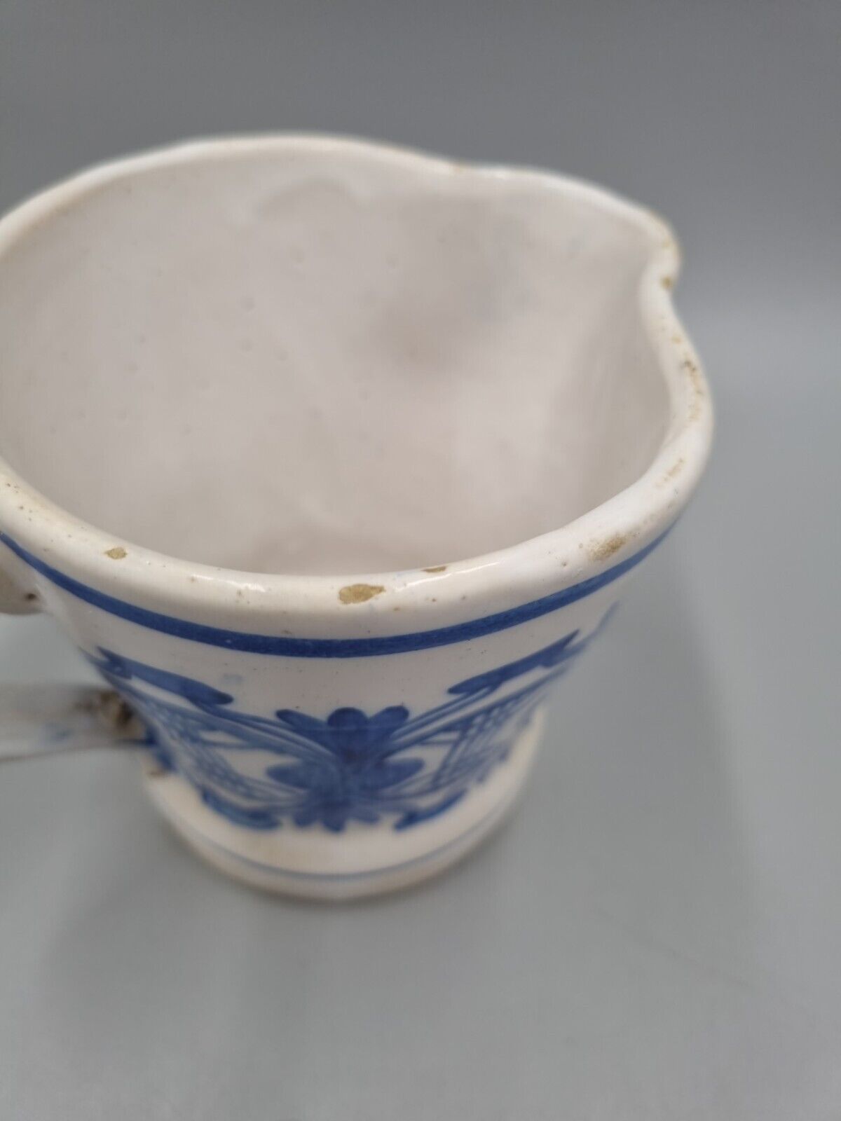 A Vintage Pottery Blue And White Jug / Creamer, Marked 'GM 37'.