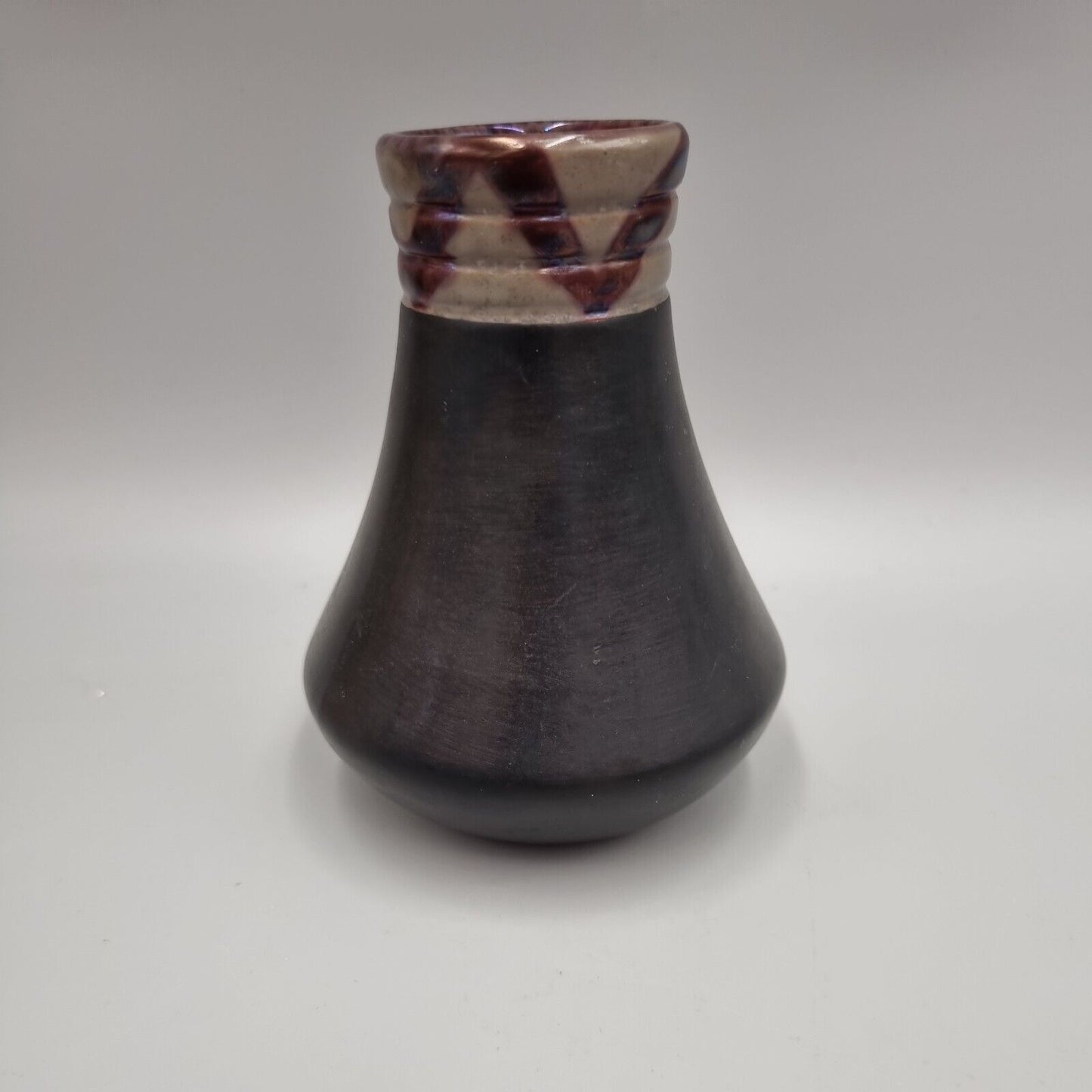 A Black Studio Pottery Conical Vase, Ampersand & Mark To The Base.