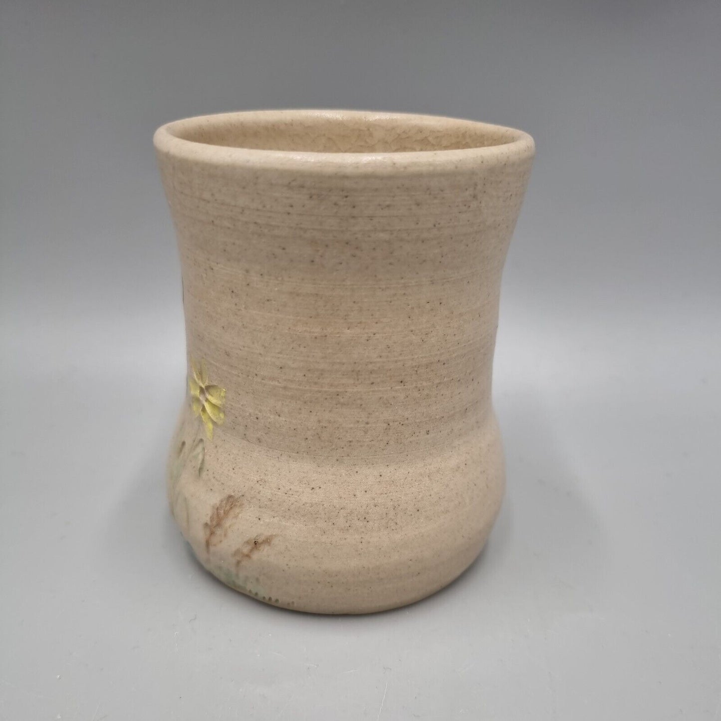 A Studio Pottery Vase With Impressed Flower Decoration, Marked To Base.