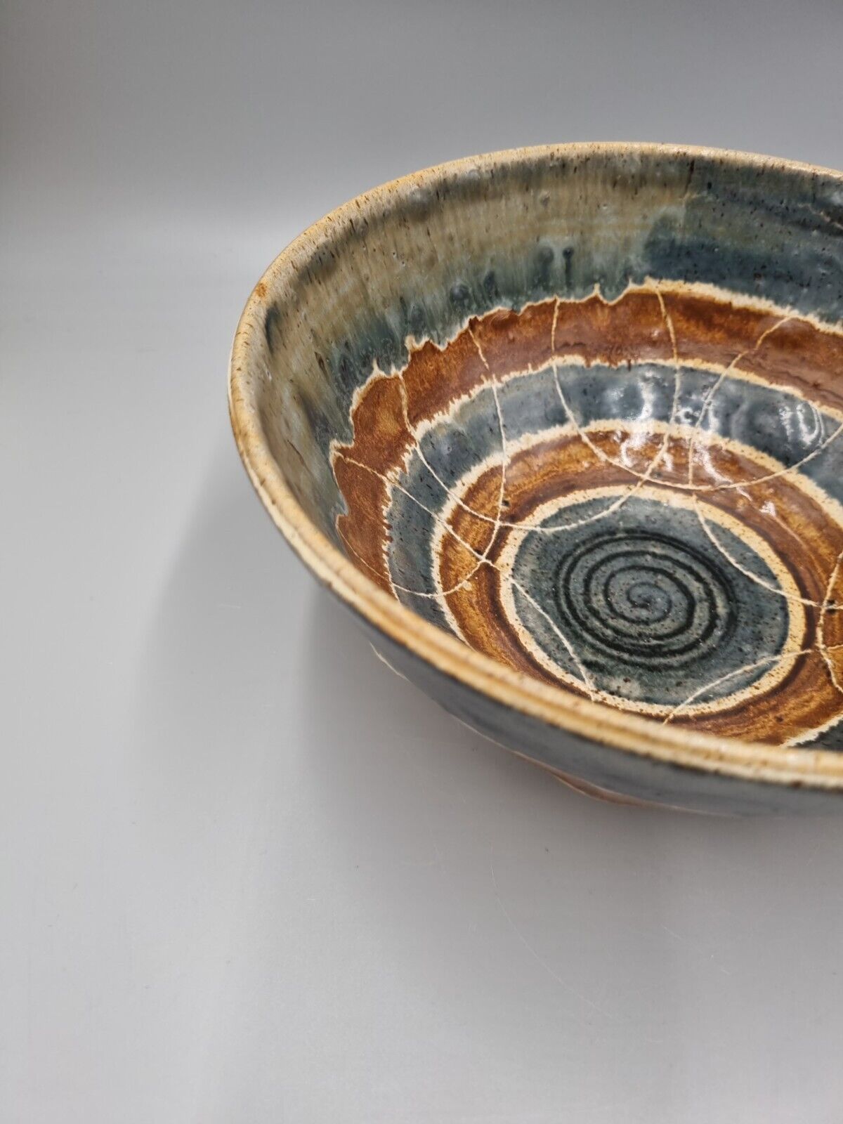 A Large Studio Pottery Bowl With Geometric Decoration, Signed 'CJ' to base.