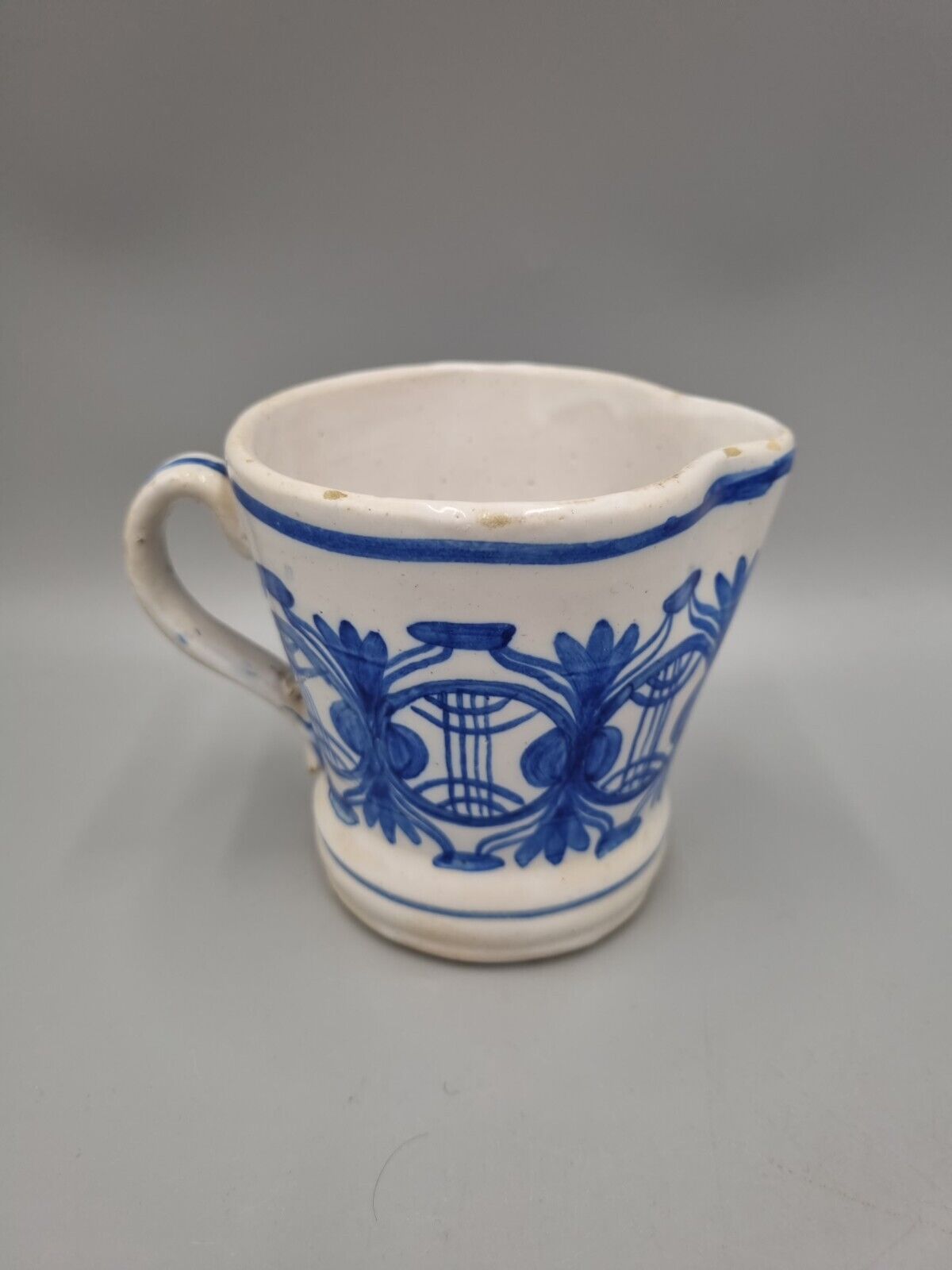 A Vintage Pottery Blue And White Jug / Creamer, Marked 'GM 37'.