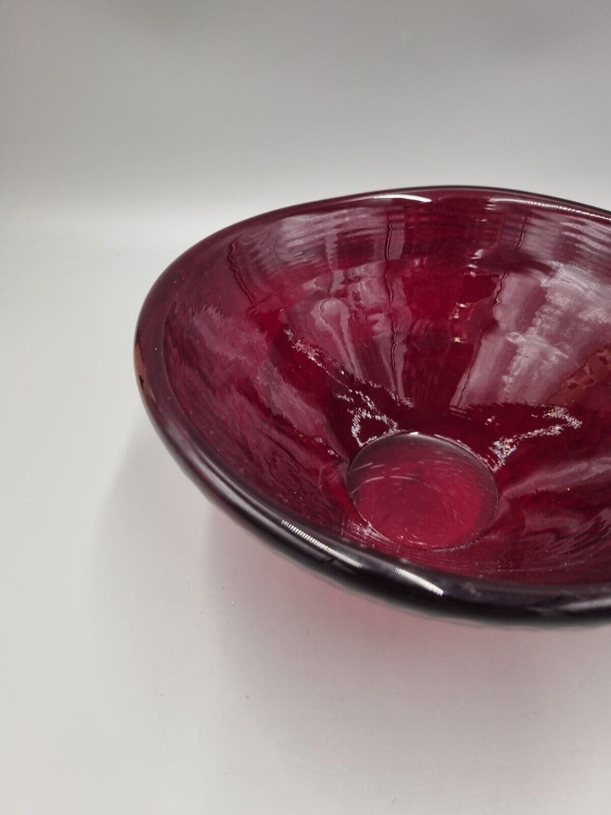 A Studio Glass Multi Faceted Red Bowl.