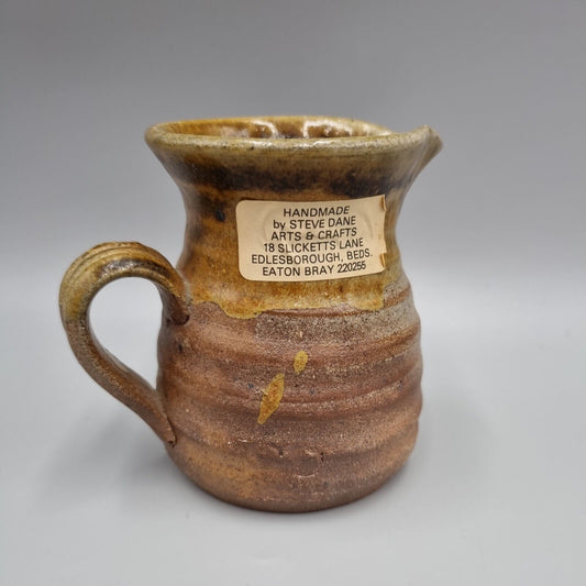 A Steve Dane Studio Pottery Stoneware Jug, Labelled & Impressed.