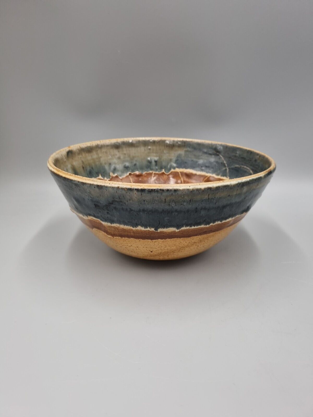 A Large Studio Pottery Bowl With Geometric Decoration, Signed 'CJ' to base.