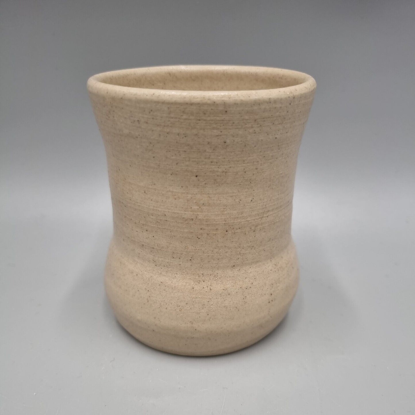 A Studio Pottery Vase With Impressed Flower Decoration, Marked To Base.