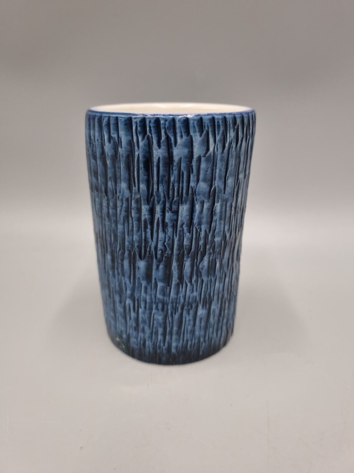 A Vintage Studio Pottery Bristow Malta Blue Textured Beaker. VGC.