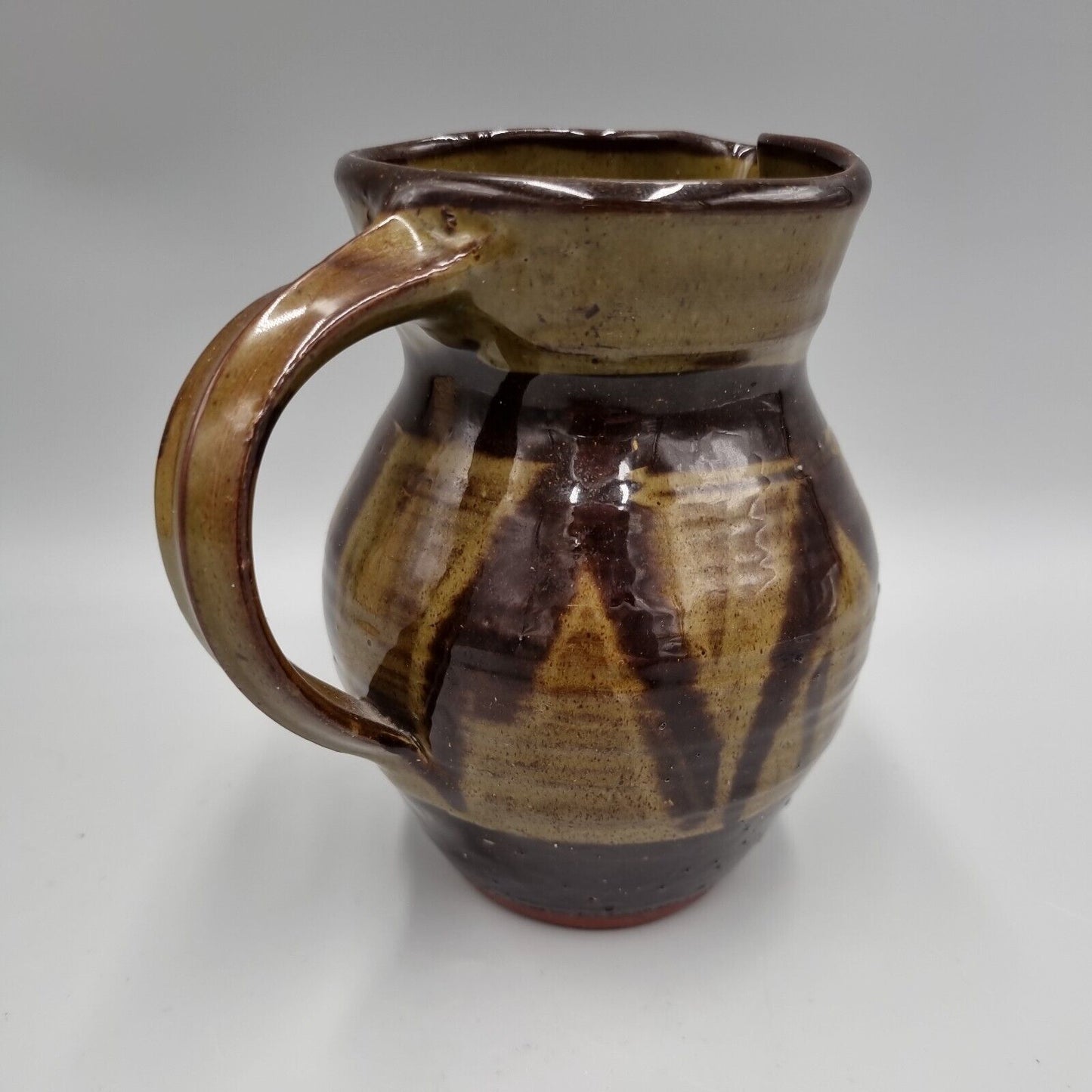 An Elizabeth Whitehouse Boscastle Studio Pottery Jug H-13.5cm. VGC.