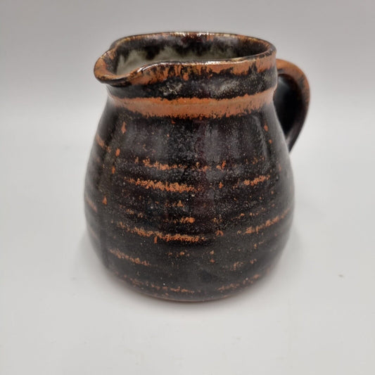 A Michael Gaitskell Of Wootton Courtenay Pottery, Somerset, Tenmoku Glazed Jug.