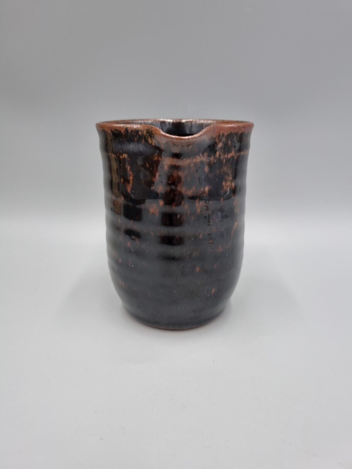 A Studio Pottery Cylinder Jug / Creamer, Signed To Base.