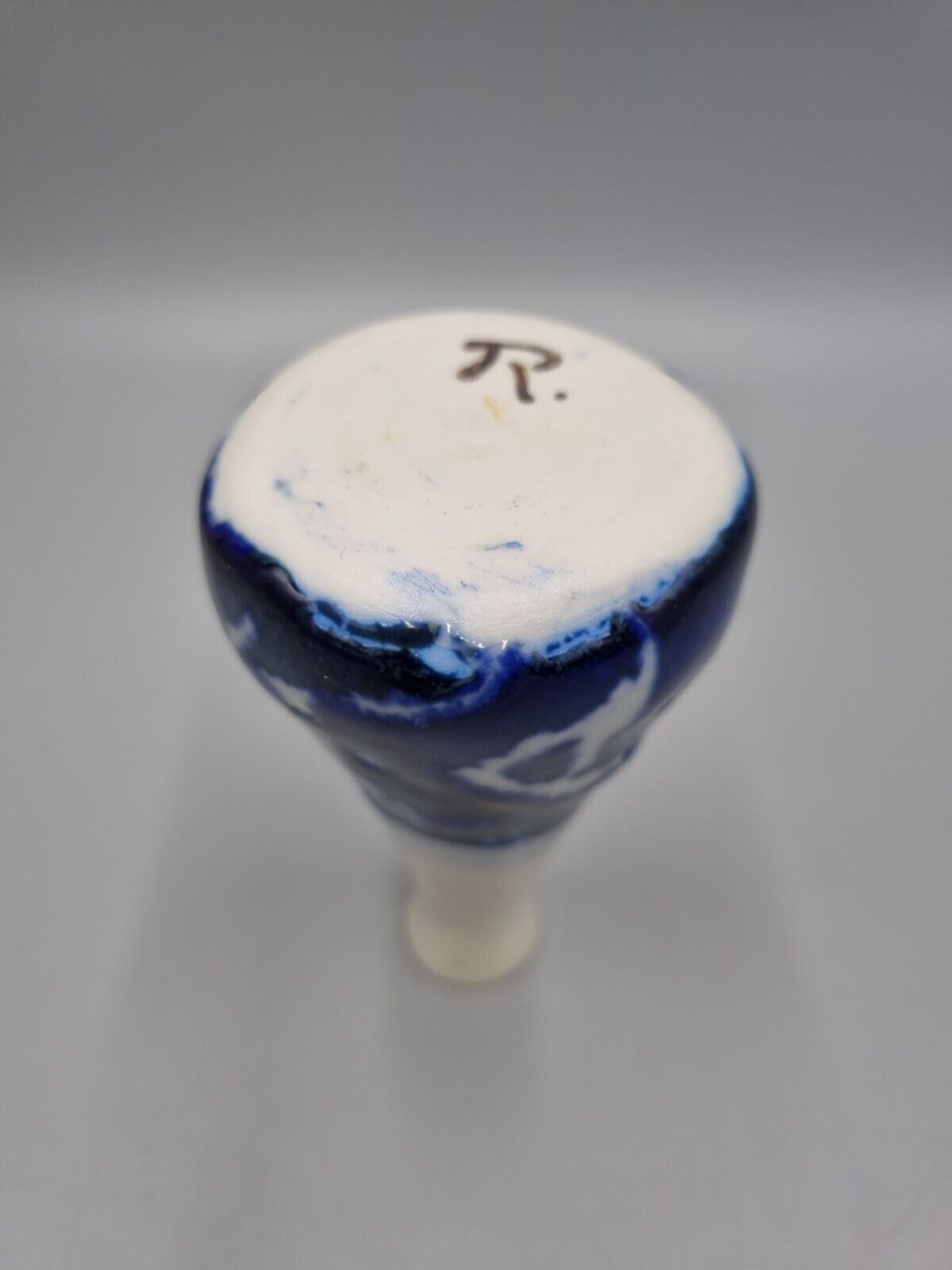 A Studio Pottery Blue & White Ceramic Conical Bud  Posy Vase. Signed 'R'.