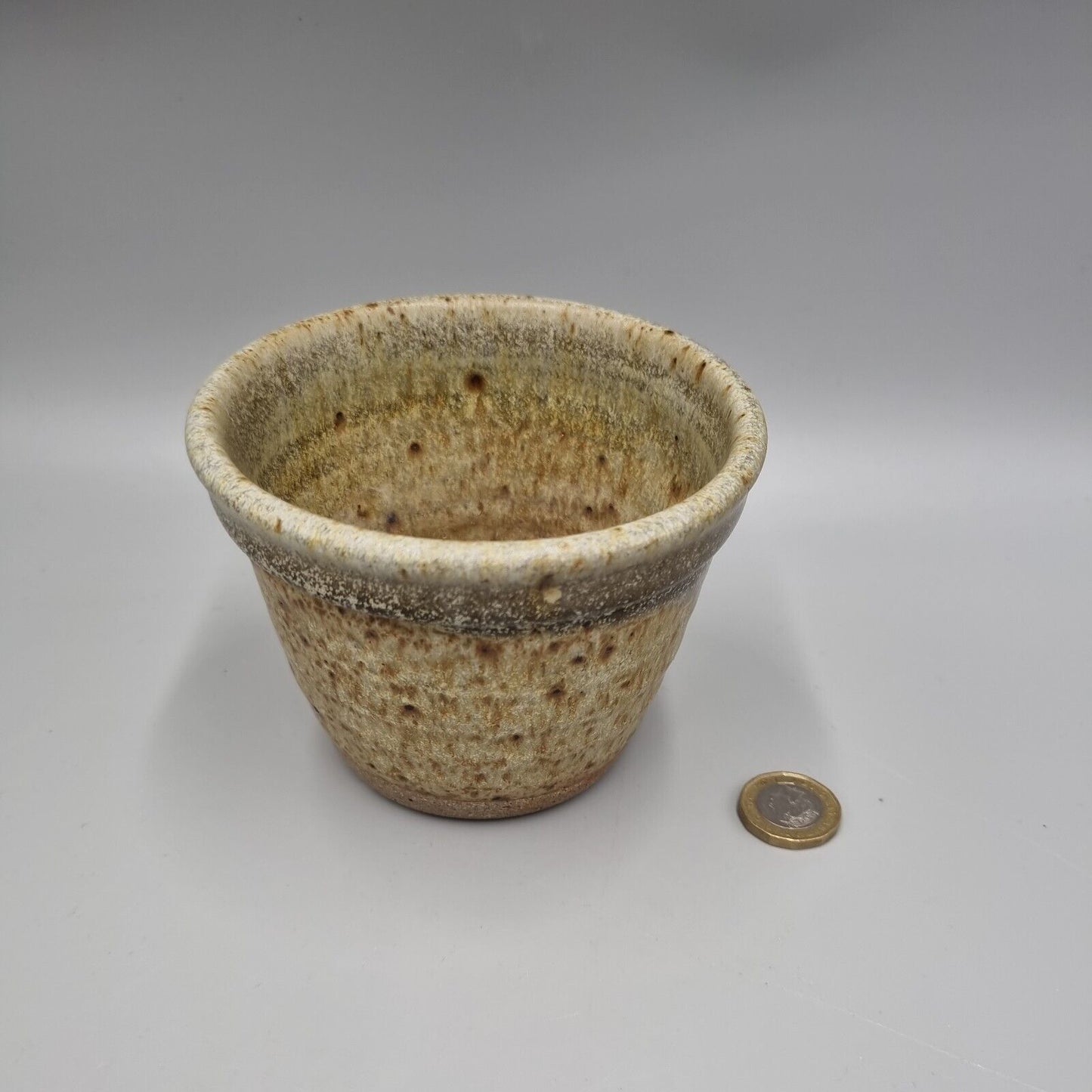 A Small Studio Pottery Plant Pot With Incised Makers Mark.