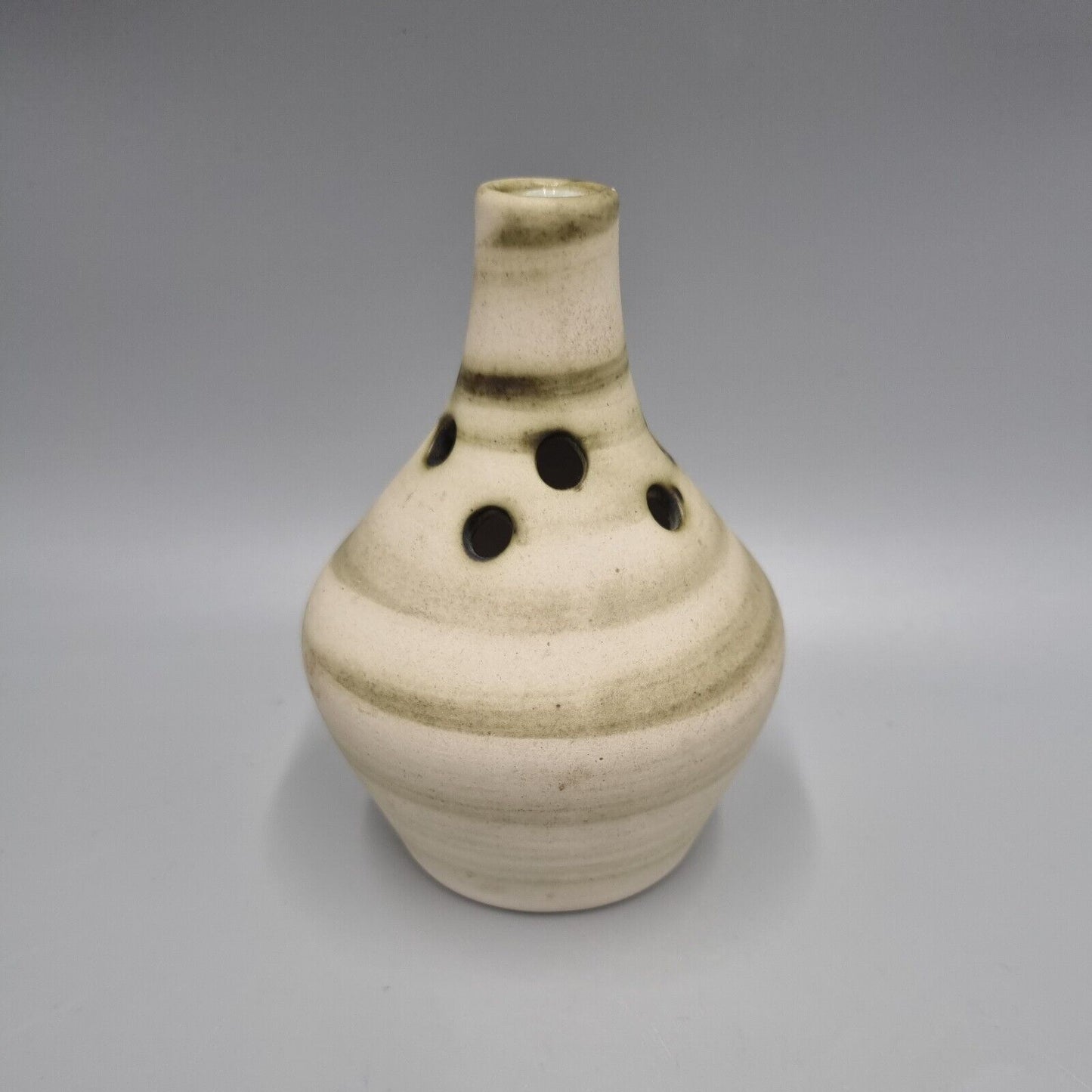 A Carn Studio Pottery Vase - John Beusmans, Round Form Bud Vase With Piercings.