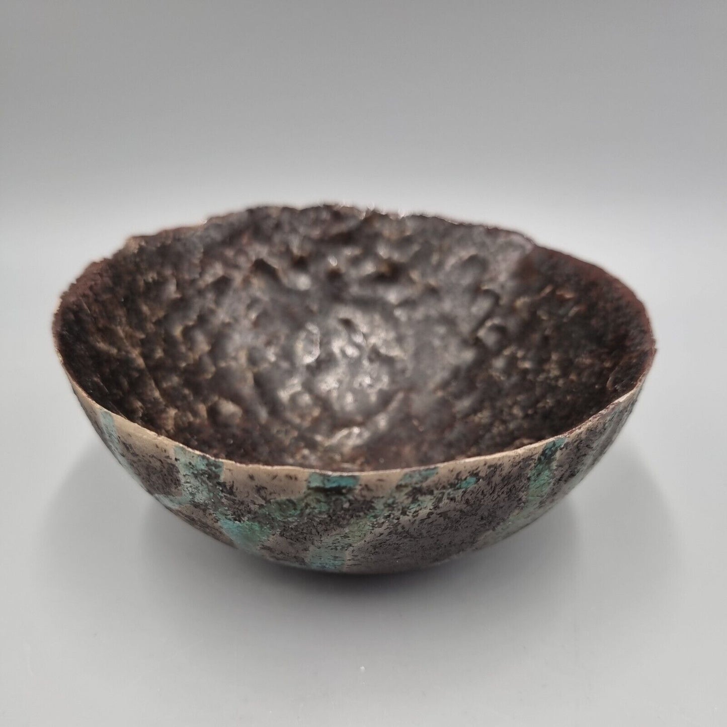 A Small Studio Pottery Raku Bowl By Marcus Finch.