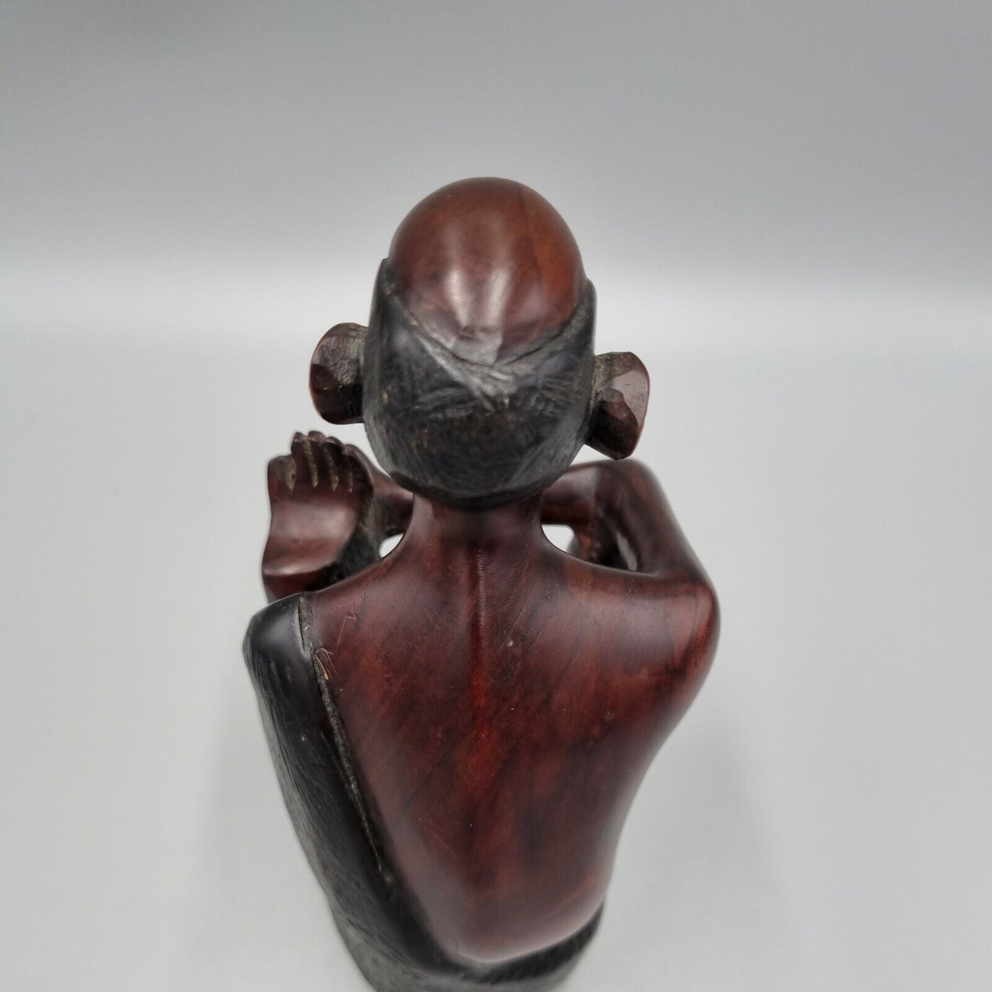 A Vintage Carved Dark Hard Wood African Seated Figure. VGC.