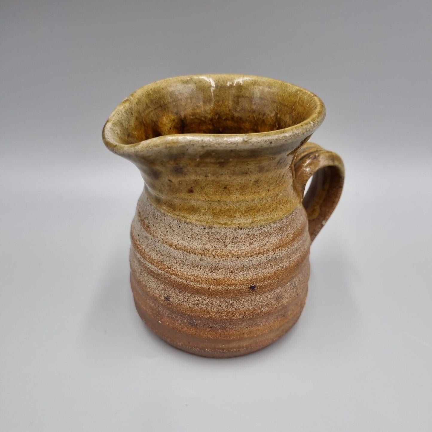 A Steve Dane Studio Pottery Stoneware Jug, Labelled & Impressed.