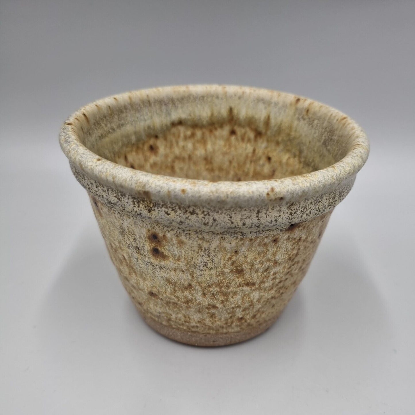 A Small Studio Pottery Plant Pot With Incised Makers Mark.