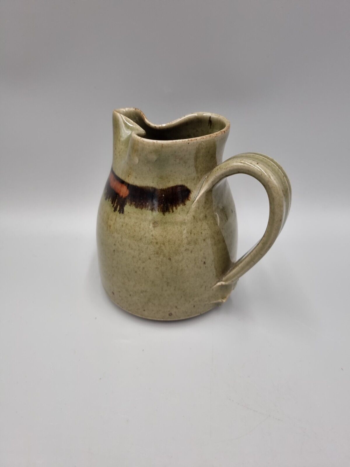 A Richard Champion, Monkleigh Studio Pottery Jug / Pitcher. Devon.