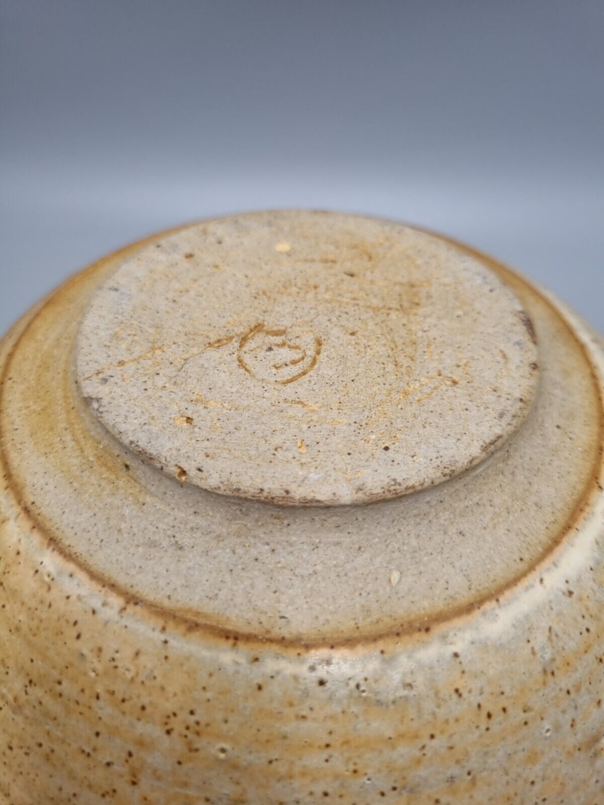 A Large Studio Pottery Bowl With Geometric Decoration, Signed 'CJ' to base.