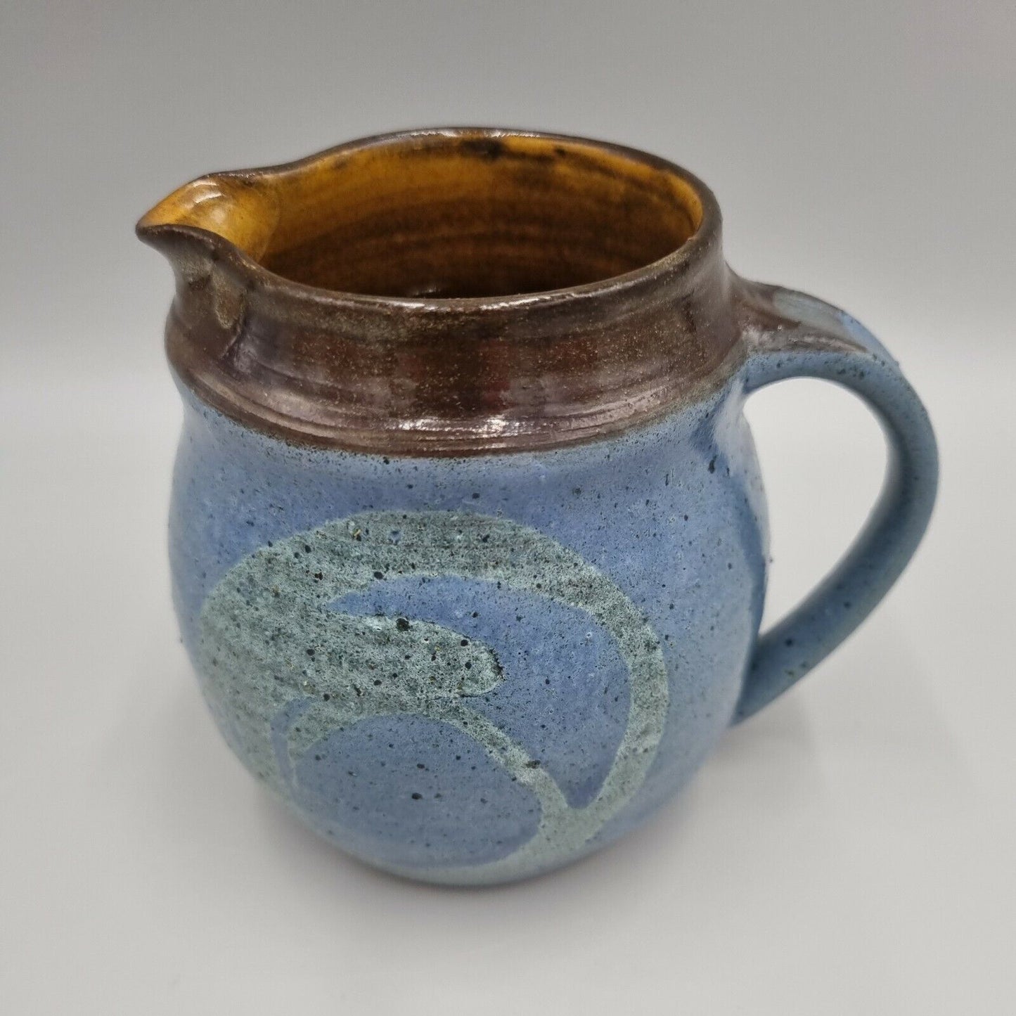 A Miles Bell Symondsbury Studio Pottery Jug, Incised to base, 'MB'.