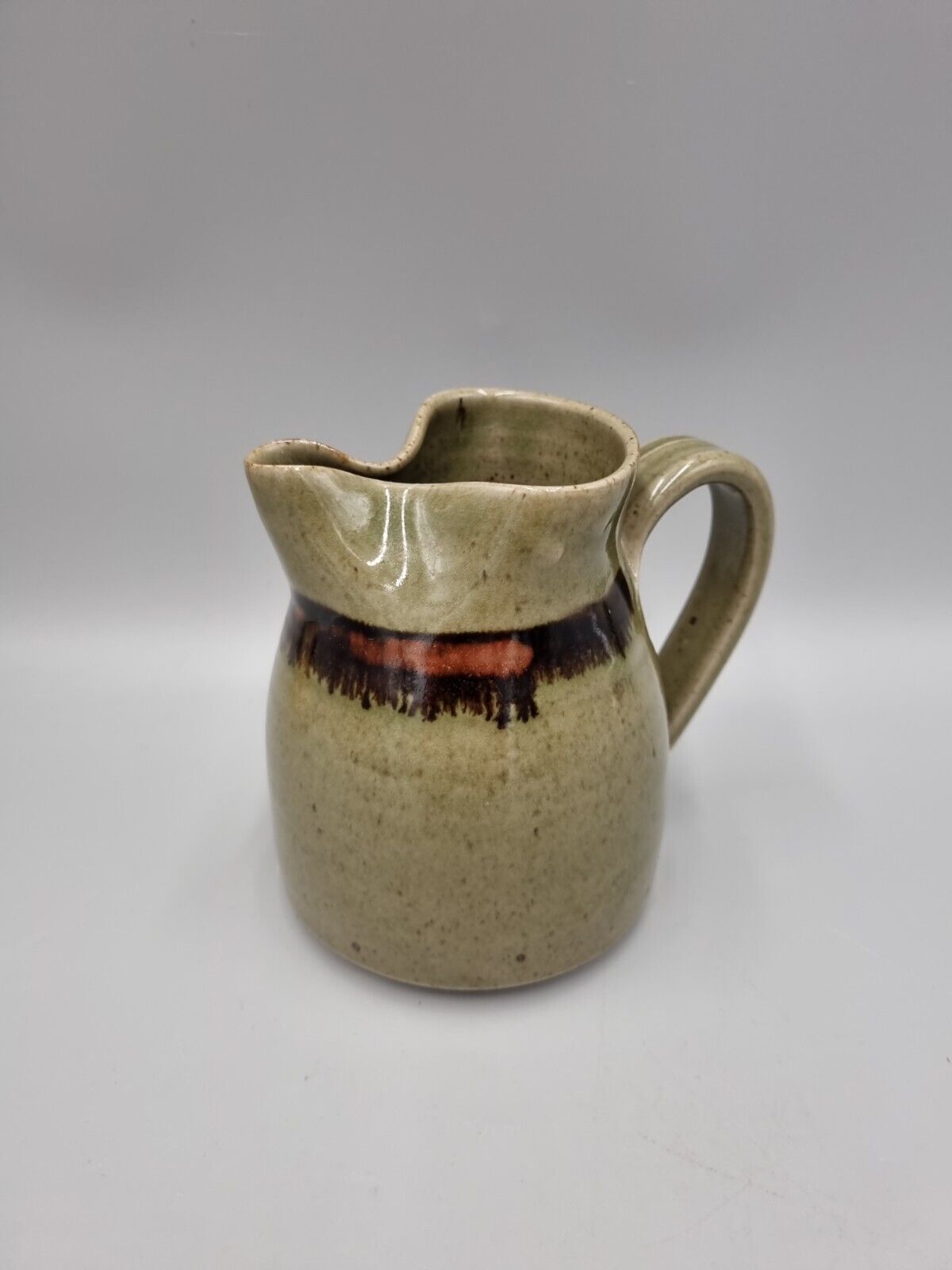 A Richard Champion, Monkleigh Studio Pottery Jug / Pitcher. Devon.