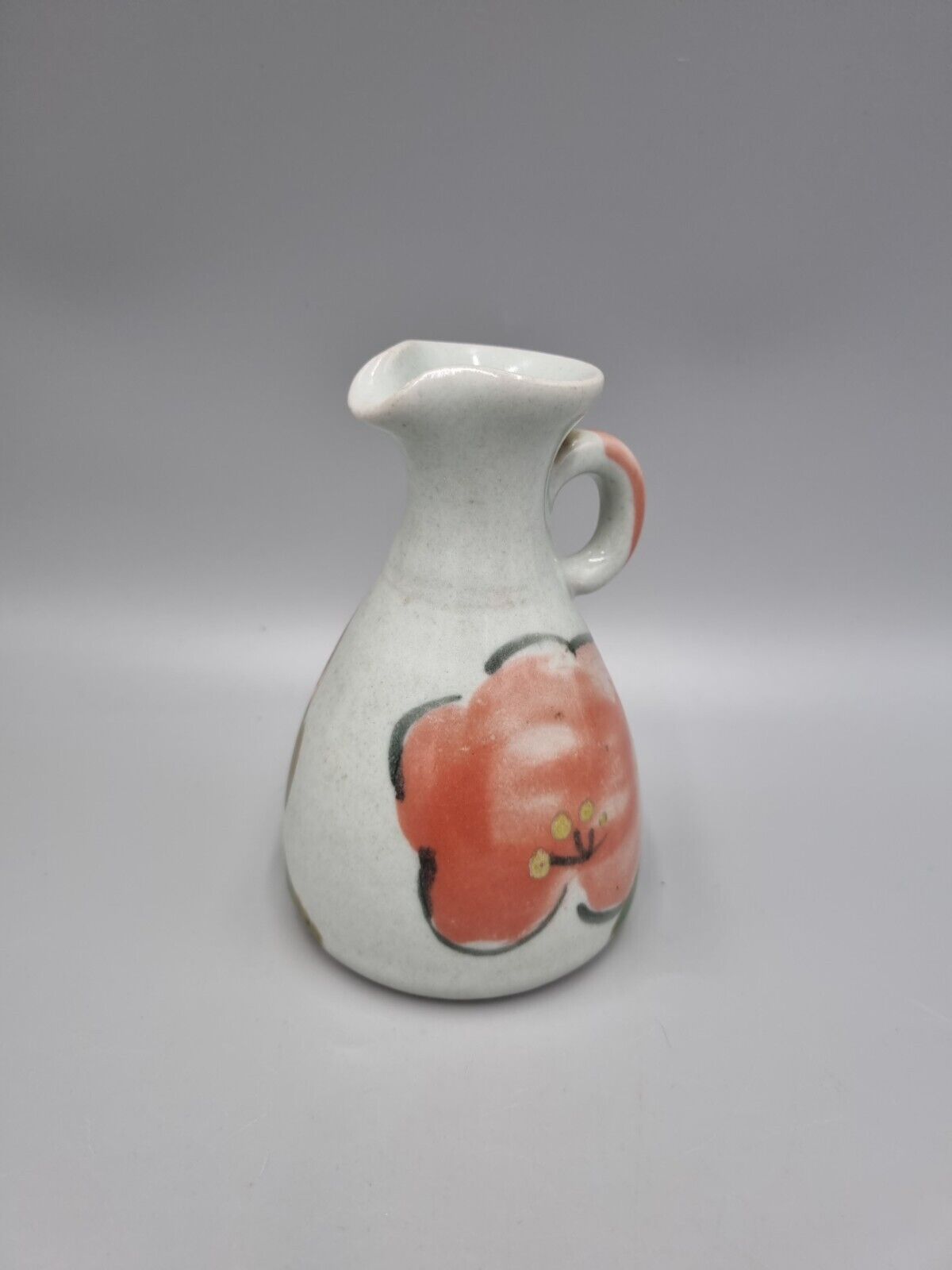 A John & Judy Jelfs Studio Pottery Flower Stoneware Jug, Bourton on Water.