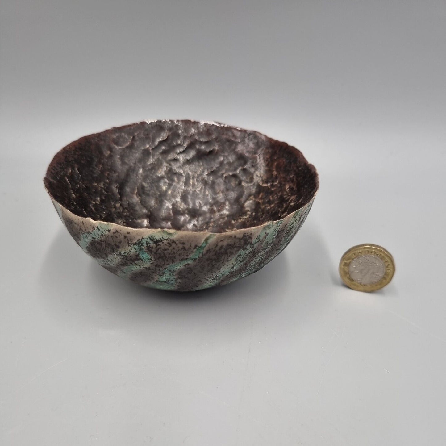 A Small Studio Pottery Raku Bowl By Marcus Finch.