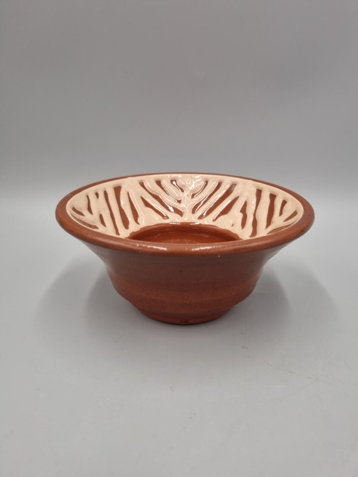 A Slip Ware Decorated Small Studio Pottery Bowl With Makers Mark.