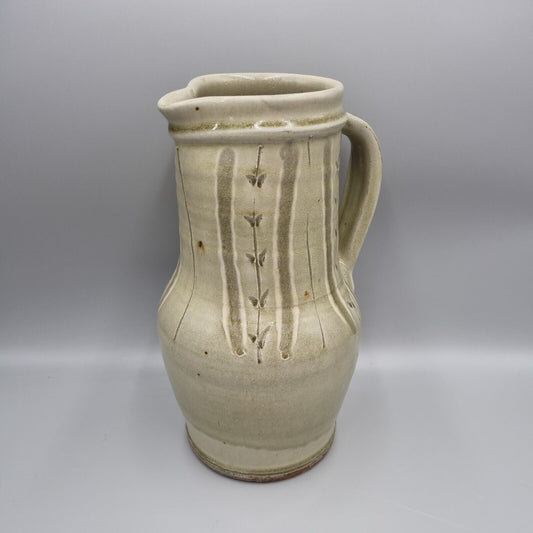 A Large Jug by Mike Dodd In Green Ash Glaze With Incised Motifs. VGC.