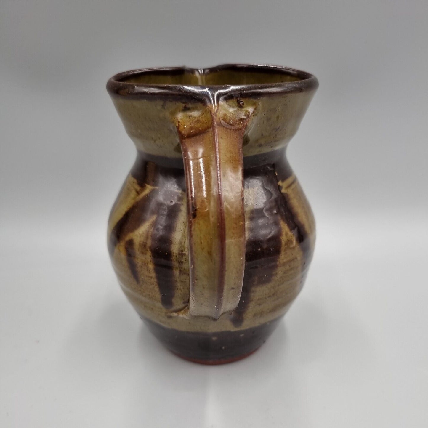 An Elizabeth Whitehouse Boscastle Studio Pottery Jug H-13.5cm. VGC.