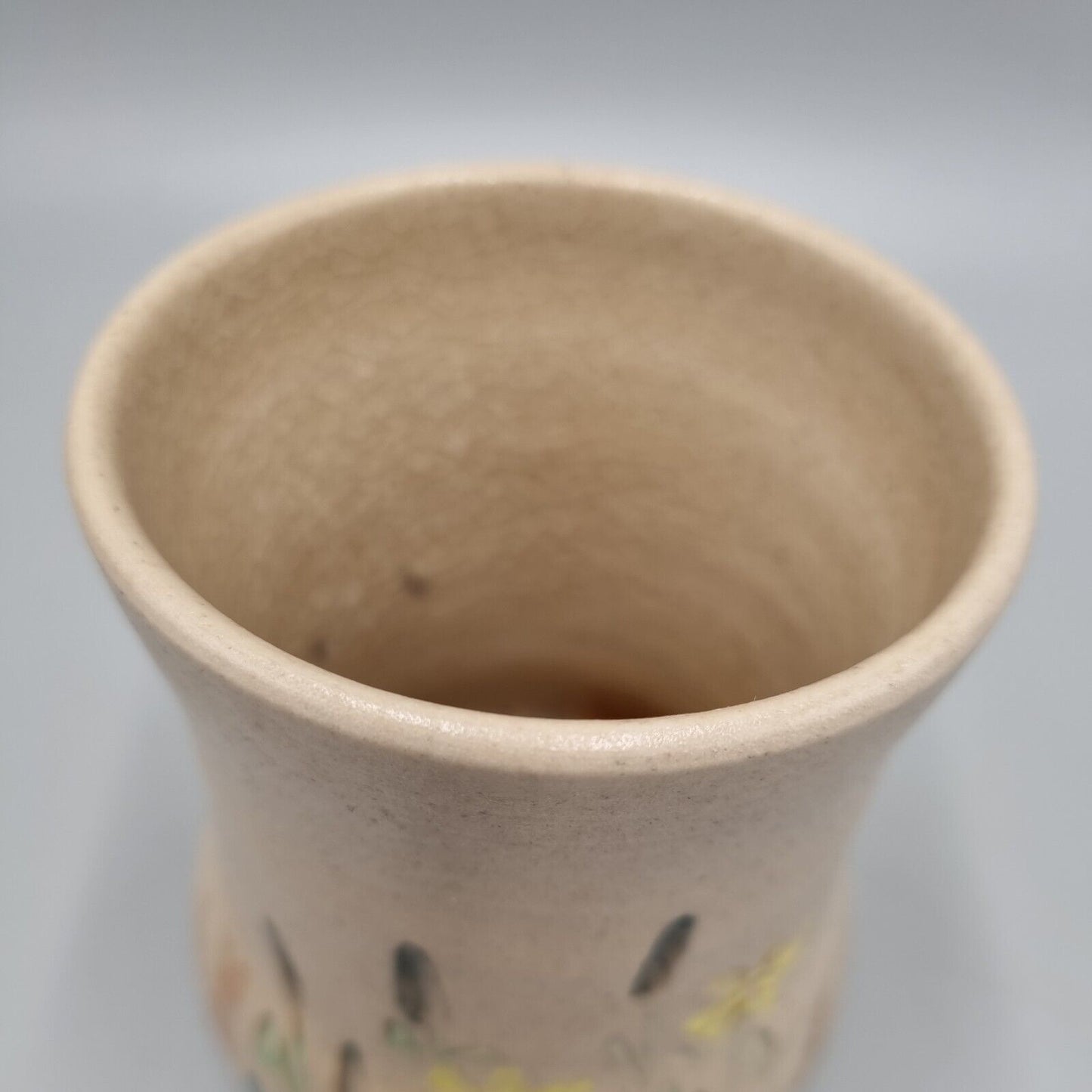 A Studio Pottery Vase With Impressed Flower Decoration, Marked To Base.