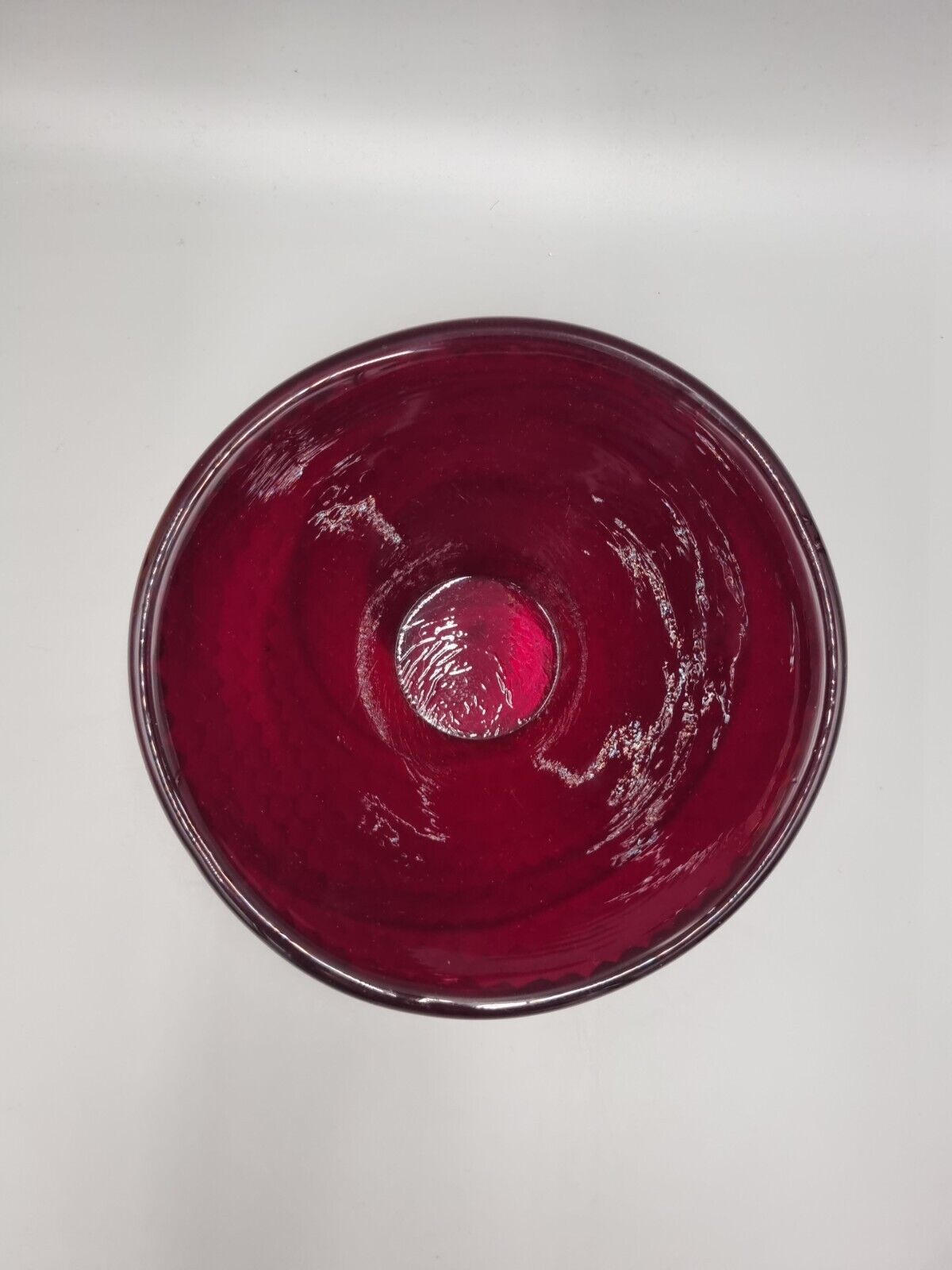 A Studio Glass Multi Faceted Red Bowl.