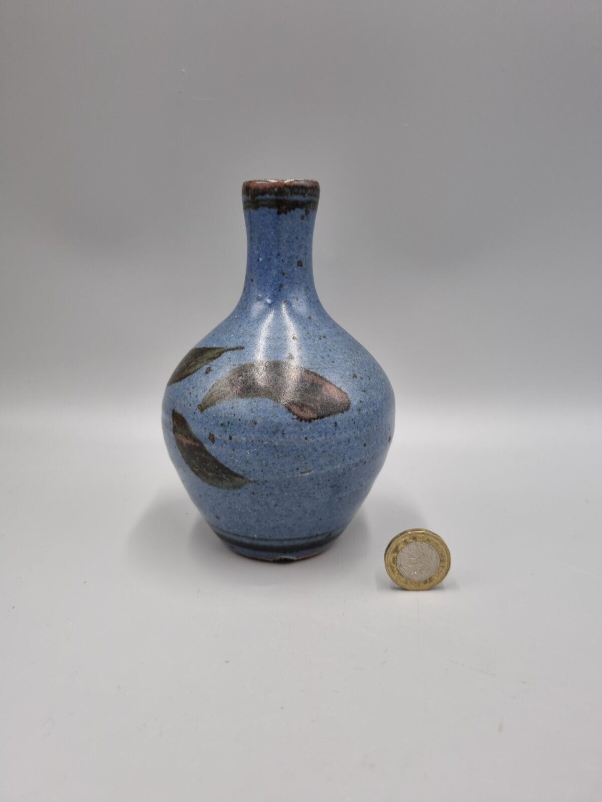 A Studio Pottery Bulb Vase By Alex Adams.