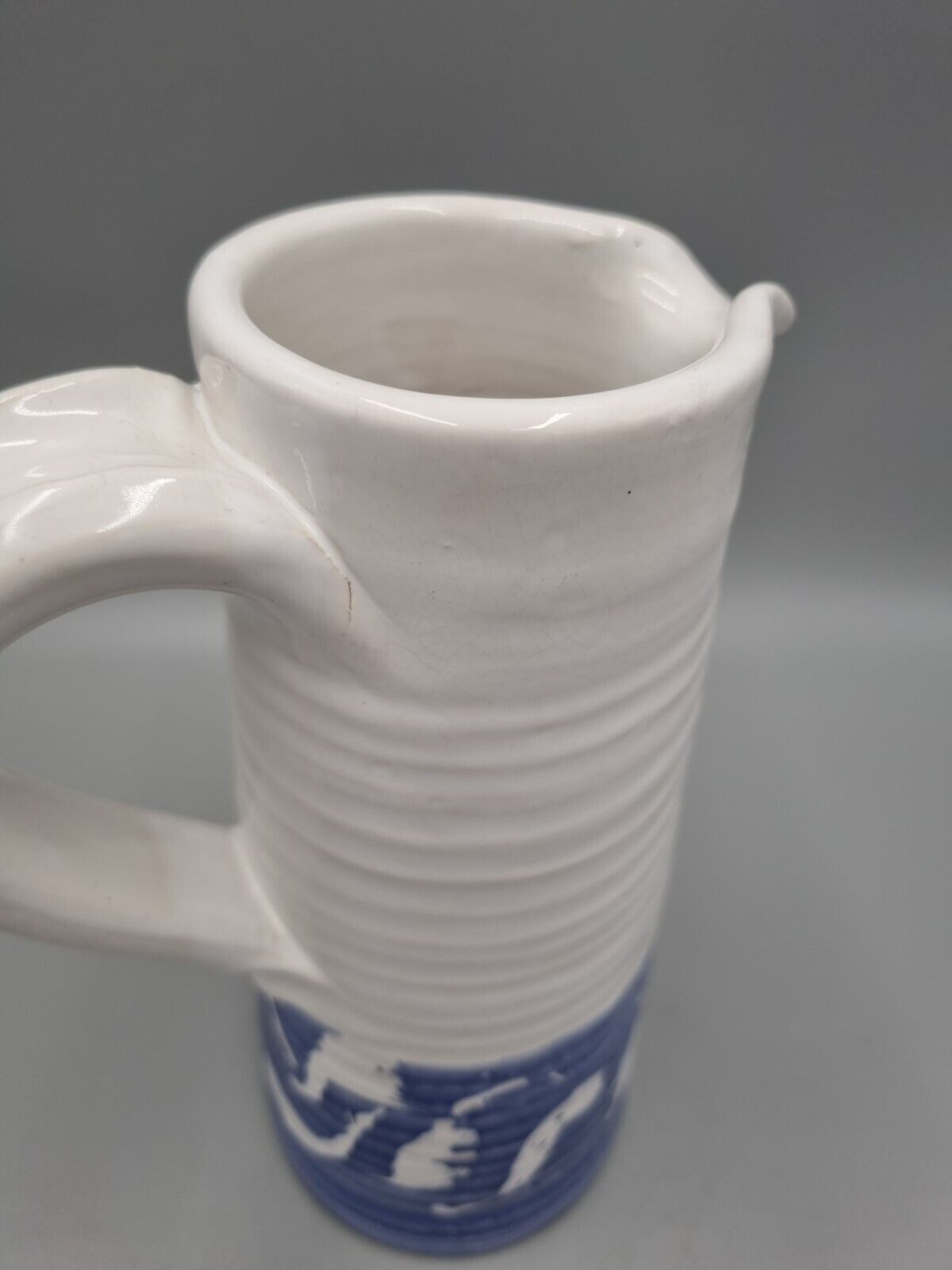 A Tall Studio Pottery Ribbed Jug / Pitcher, Unmarked.