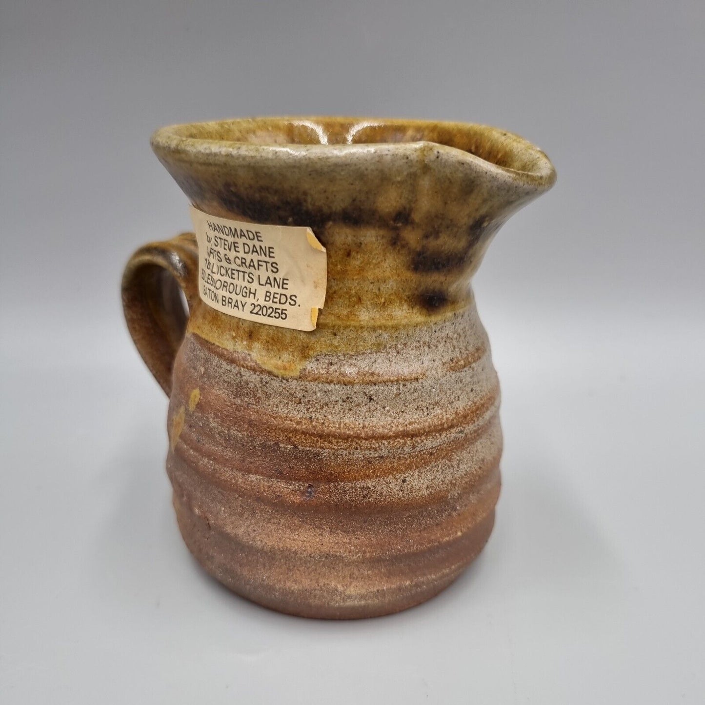 A Steve Dane Studio Pottery Stoneware Jug, Labelled & Impressed.