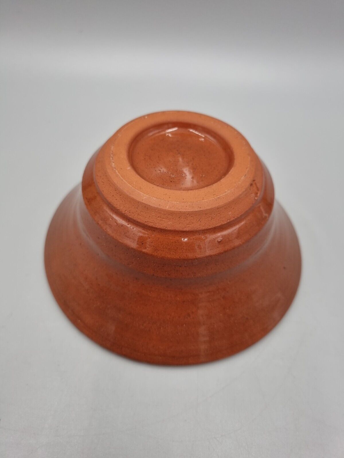 A Slip Ware Decorated Small Studio Pottery Bowl With Makers Mark.