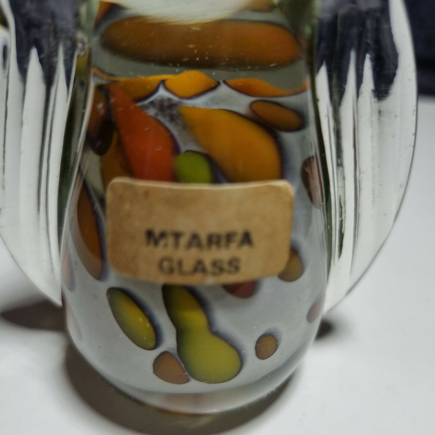 Vintage Mtarfa glass paperweight. Labelled, orange and yellow.