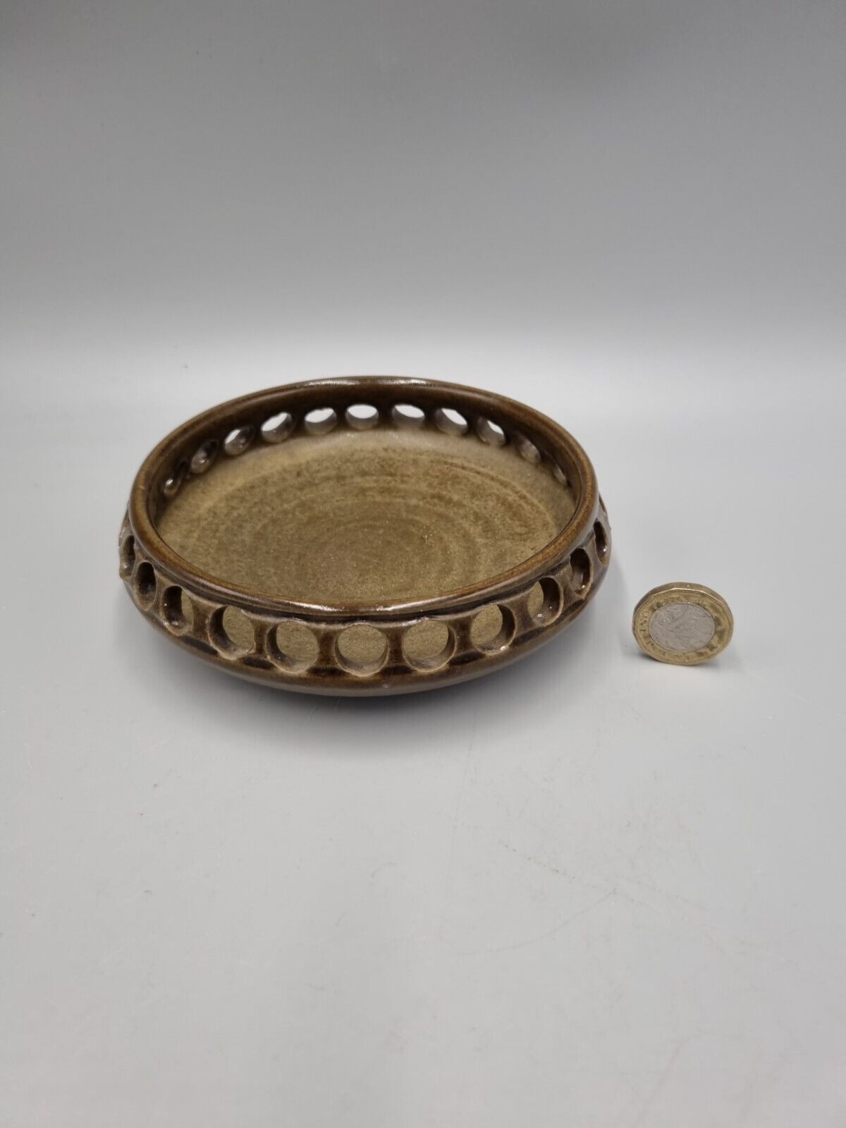 A  Studio Pottery Pierced Shallow Bowl, Impressed Flower Mark.