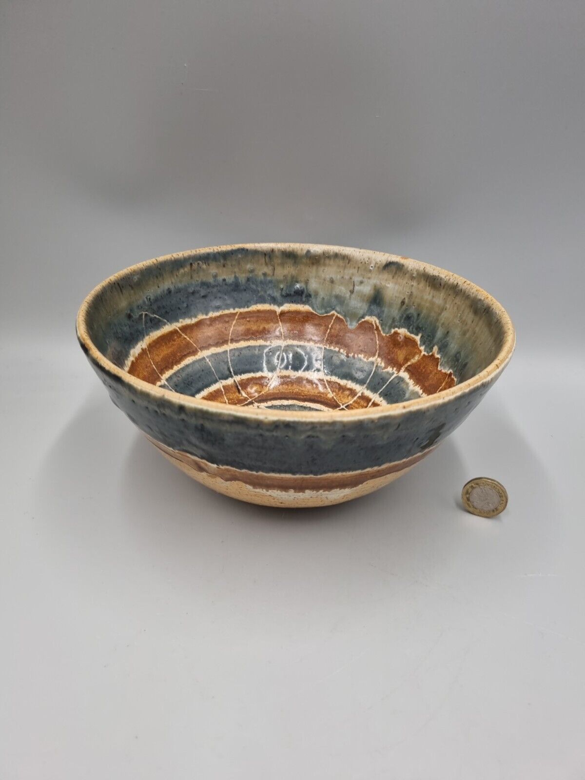 A Large Studio Pottery Bowl With Geometric Decoration, Signed 'CJ' to base.