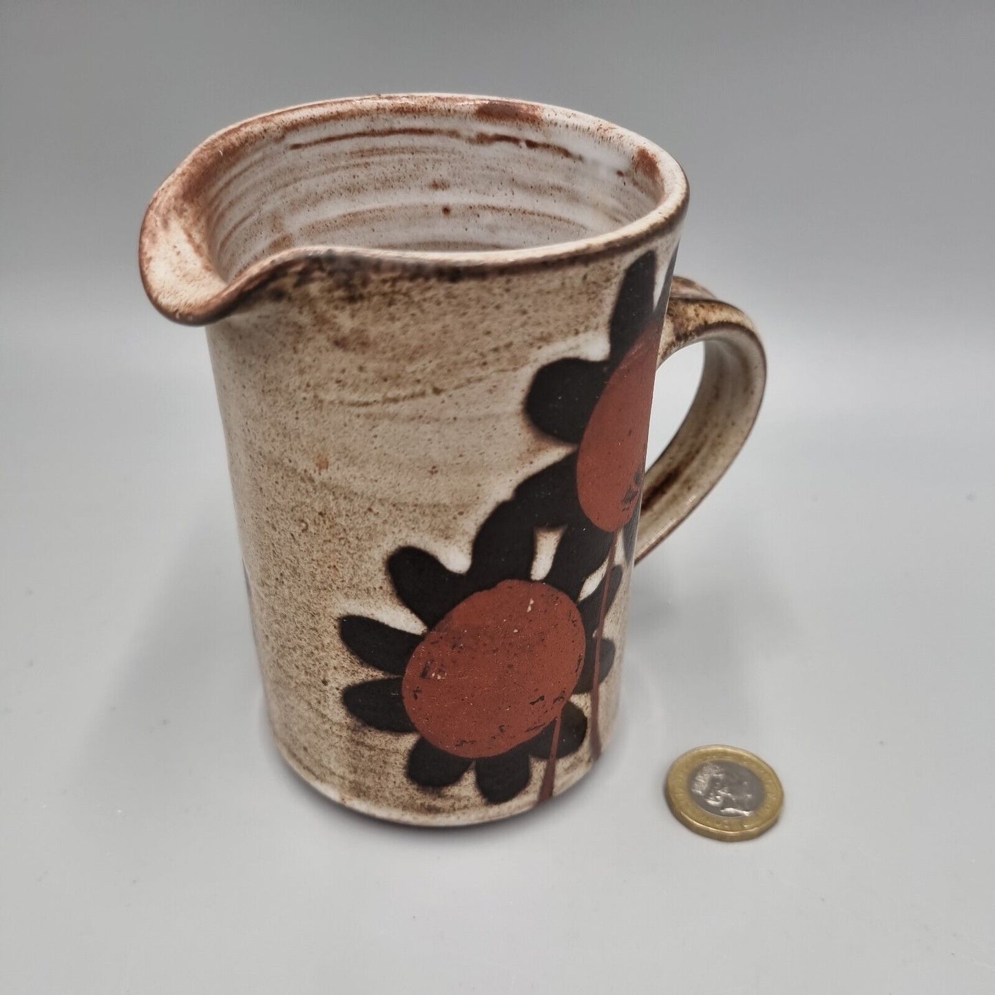 A Vintage Briglin Studio Pottery Water / Milk Jug, Sunflower Design. VGC.