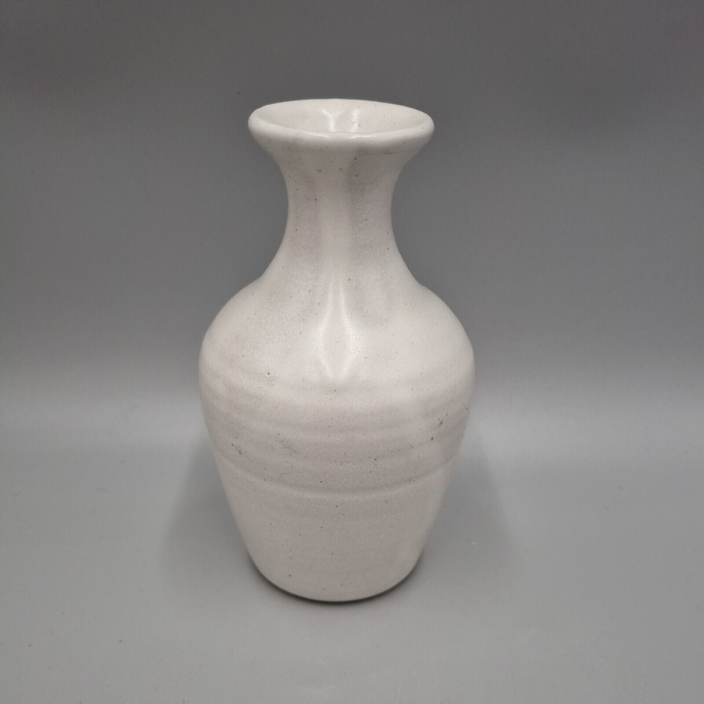 A Studio Pottery blue And White Waisted Neck Vase, Impressed 'Pot' Mark To Base.