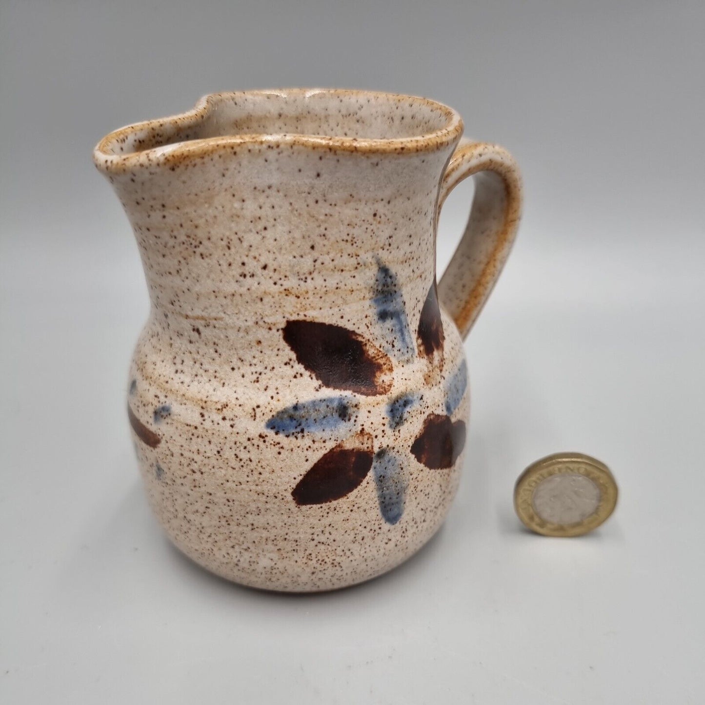 A small studio Pottery Milk Jug With Cross Mark, John Bedding?