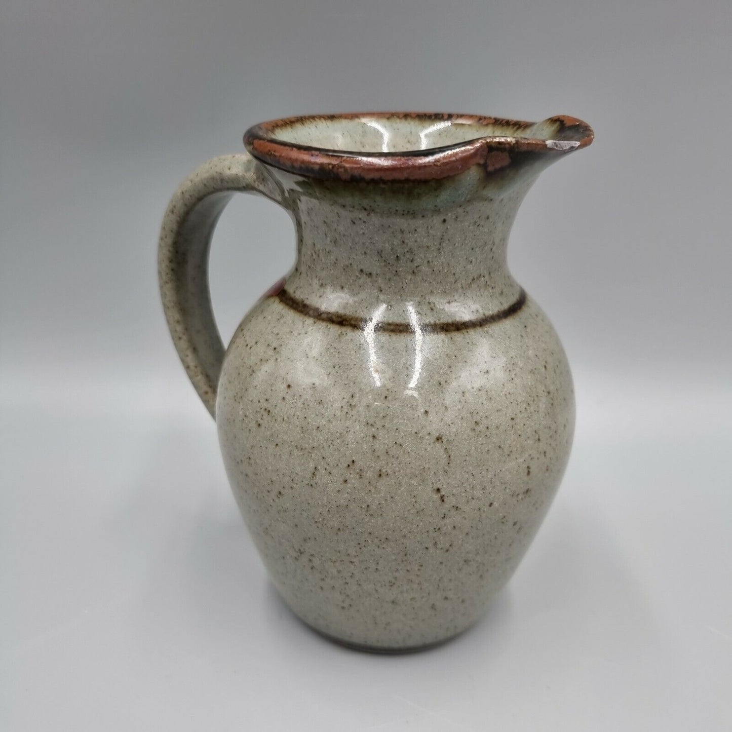 A Studio Pottery Stoneware Decorated Jug By Devon Potter Nick Douglas.