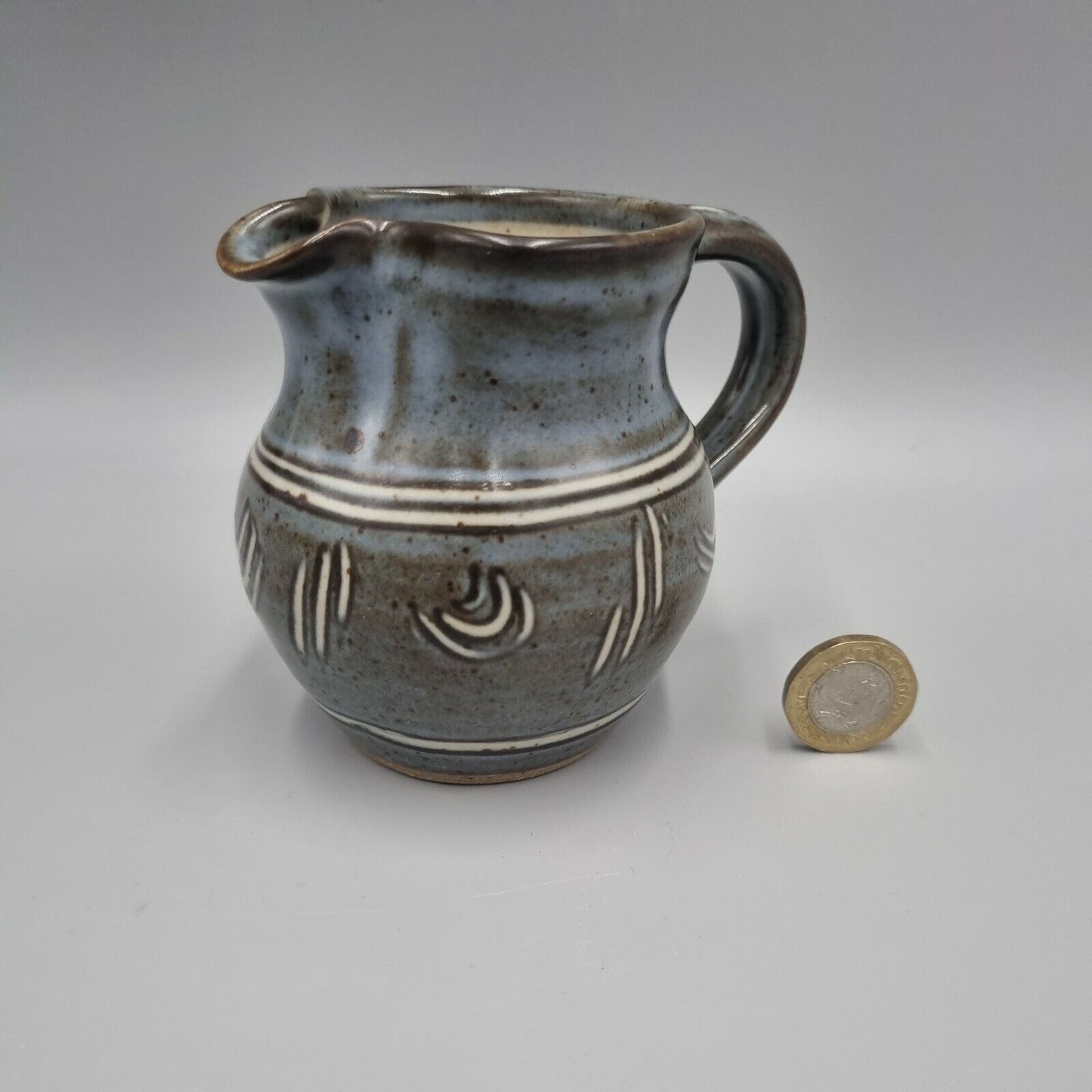 A Winchcombe Pottery Slipware Jug , Cardew, Finch etc. Blue & White.