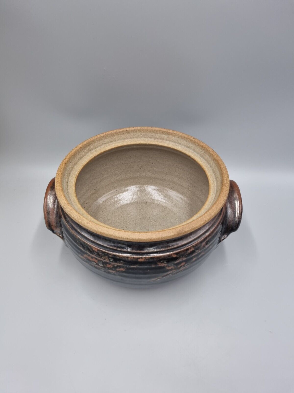 A Large Studio Pottery Lidded Casserole Dish By John Lomas.