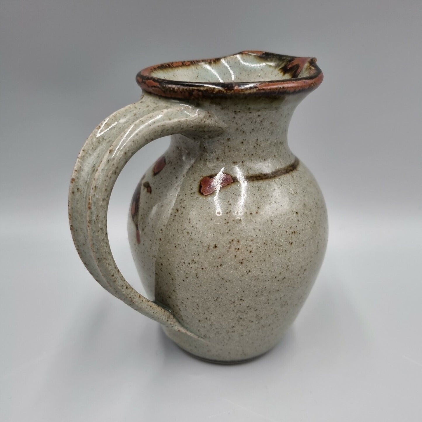 A Studio Pottery Stoneware Decorated Jug By Devon Potter Nick Douglas.