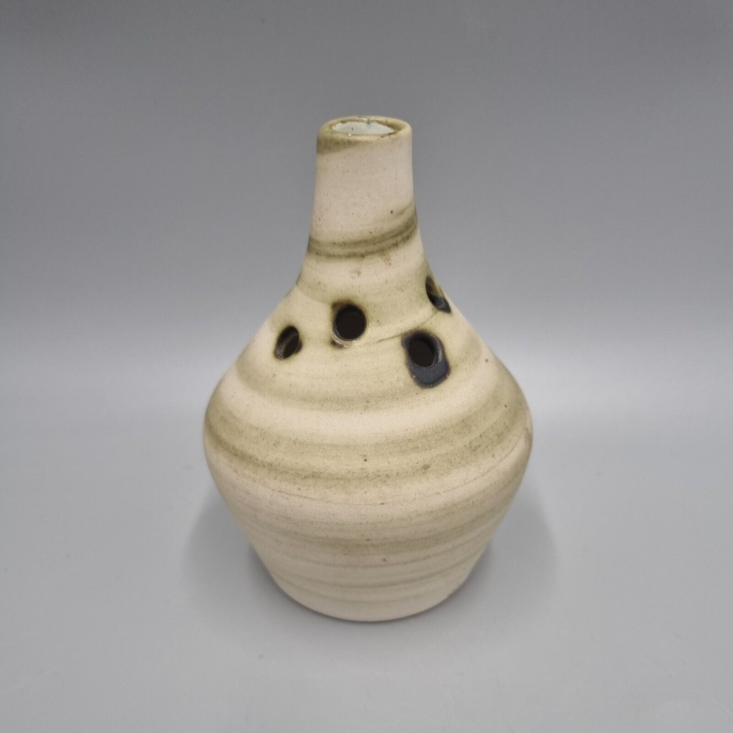 A Carn Studio Pottery Vase - John Beusmans, Round Form Bud Vase With Piercings.