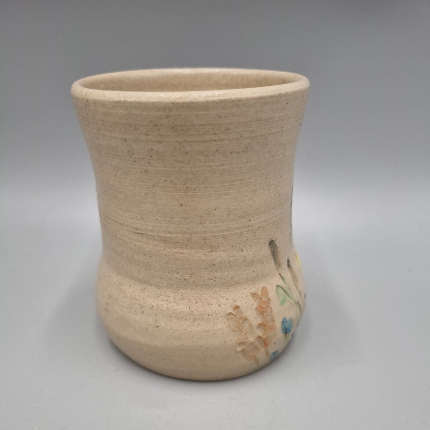 A Studio Pottery Vase With Impressed Flower Decoration, Marked To Base.