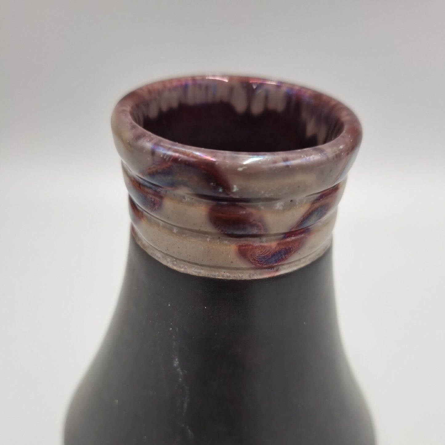 A Black Studio Pottery Conical Vase, Ampersand & Mark To The Base.